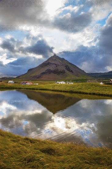 Quiet summer evening on Iceland. Sunset in the fishing village of Arnastapi