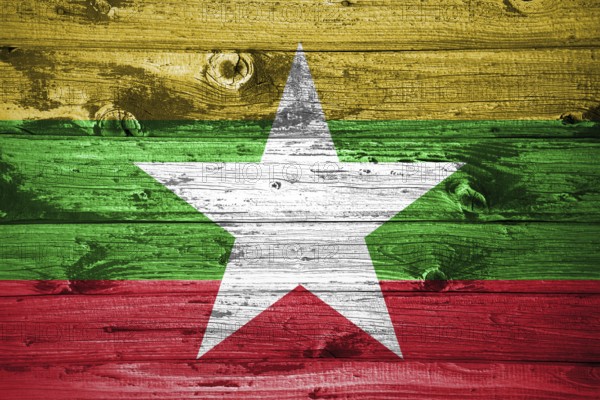 Myanmar flag on wooden planks background wood flag
