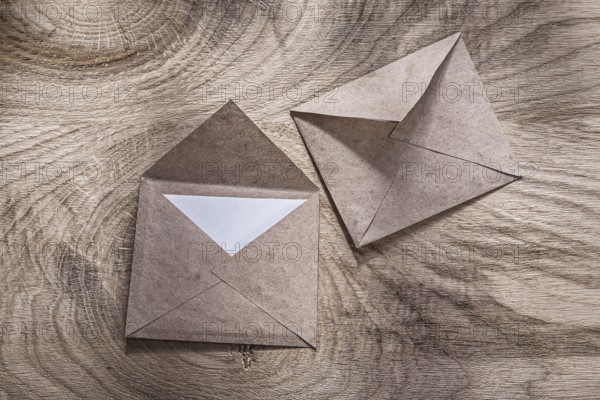 Vintage post envelopes on wooden board