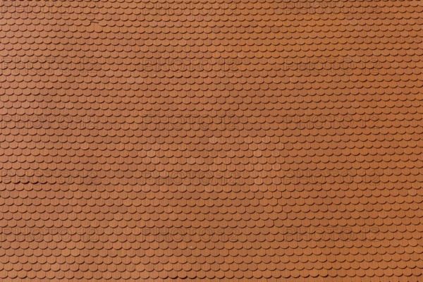 Closeup of new red color clay ceramic roof on building, background, Mikulov, Czech Republic, Europe