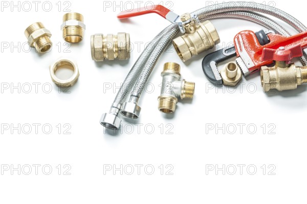 Adjustable wrench pipe fittings isolated on white