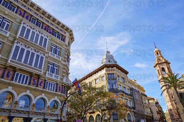 Valencia Casa Isla de Cuba and Santa Catalina tower church in La Paz street of Spain