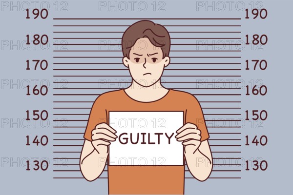 Man criminal with inscription guilty on sign stands near lines for measuring height of arrested bandit. Guilty guy who committed crime is detained by police and needs help of lawyer for court hearing