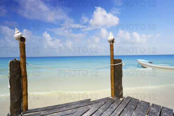 Holbox tropical Island wooden pier in Quintana Roo of Mexico