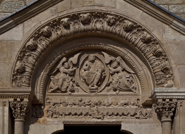 St-Julien-de-Jonzy Burgundy Parish Church West portal 12th century Tympanum Christ in the mandorla carried by angels in the architrave Last Supper and washing of feet, St, Saint, Saint