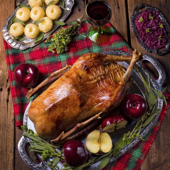 Roast Christmas duck with apples