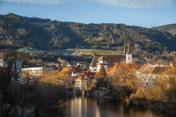 View of the historic city centre, old town of Leoben at the river Mur, Schwammerlturm and church St. Xaver, long exposure, Leoben, Styria, Austria, Europe