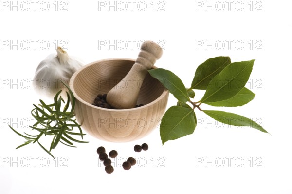 Mortar and pestle, with fresh-picked herbs