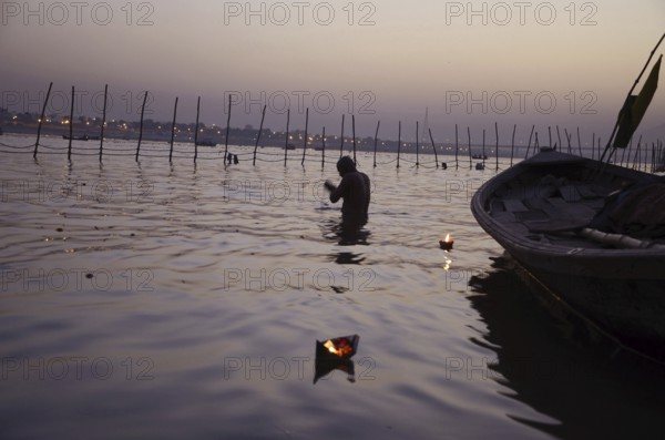 Man bathing in river Kumbh Mela at Allahabad Uttar Pradesh India