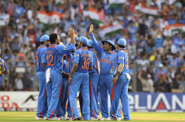 Cricketer 2LYuvraj Singh celebrate wicket Sri lankan batsman Thilan Sararaweera ICC Cricket World Cup Wankhede stadium Mumbai