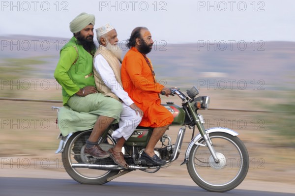 Men on motorbike NOMR