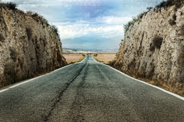 Old dramatic asphalt road