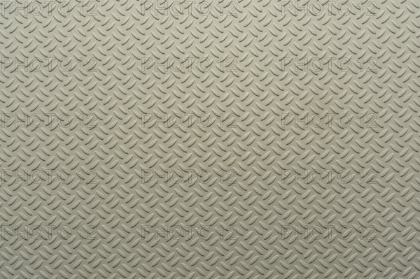 An image of a checker plate material background