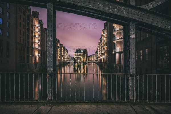 The moated castle in the Speicherstadt, photographed from the Poggemühlenbrücke bridge