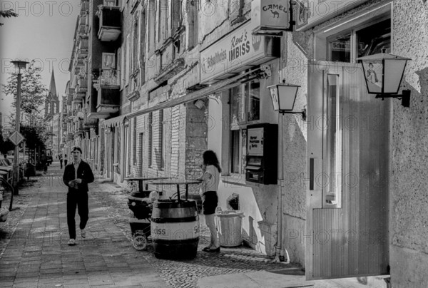Germany, Berlin, 27 July 1991, Stargarder Straße, Rene's Imbiss, beer kegs, Europe
