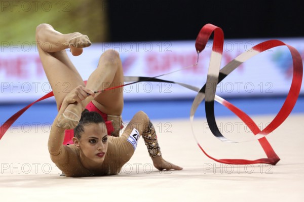 Sofia, Bulgaria - 14 September, 2018: Linoy ASHRAM from Israel performs with ribbon during The 2018 Rhythmic Gymnastics World Championships. Individual tournament