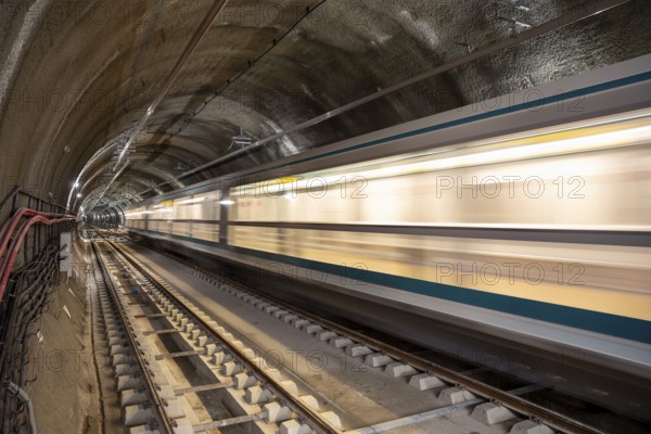 Subway tunnel rail tracks. Long exposure. Blurred lights