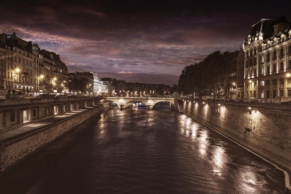 Paris Seine river sunset in France at Saint Michel