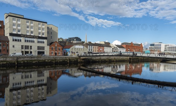 Cork, Ireland, February 24 2023: Colorful buildings reflected on river lee. Cork city cityscape Ireland Europe, Europe