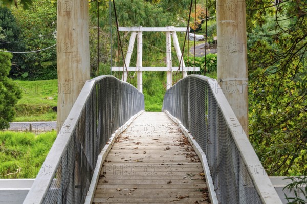 Redwood Bridge is a 34 meter suspension footbridge across the Yarra River, Warburton, Victoria, Australia, Oceania