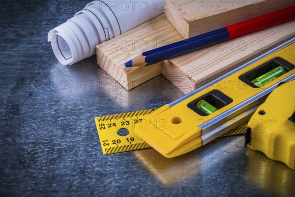 Great number of construction working tools on metallic scratched background architecture and building concept