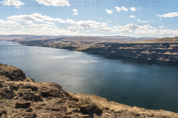 The huge Columbia river in Washington state, dry landscape surrounding the water, USA, North America