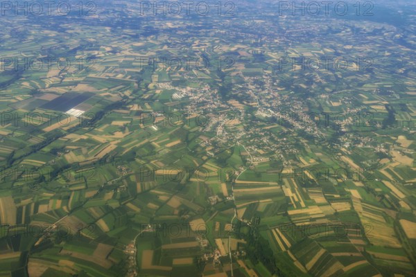 Aerial View of green fields, forest countryside