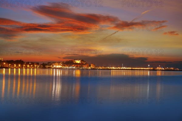 Denia sunset skyline from Las Rotas in Alicante of Mediterranean Spain