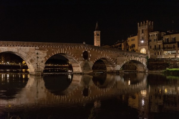 Beautiful Ponte Pietra in Verona at night, Italy, Europe