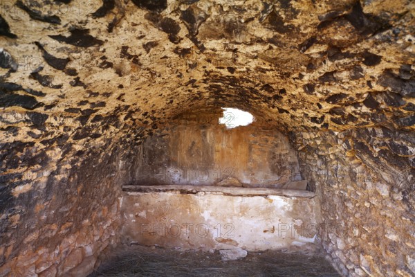 Mediterranean livestock cabin barn of masonry with traditional trough