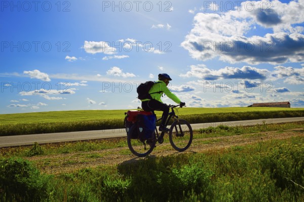 Biker on The Way of Saint James biking in Palencia Spain
