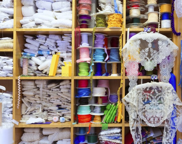 Valencia details of embroidery in old haberdashery in Plaza Redonda at Spain