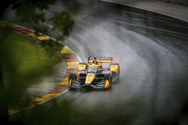 THEO POURCHAIRE (R) (6) of Grasse, France comes through turn 12 (Canada Corner) during a wet practice session for the XPEL Grand Prix at Road America in Elkhart Lake, WI