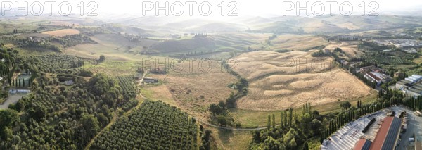 Tuscan landscape on a road of cypress trees near San Quirico d Orcia, Italy, Europe