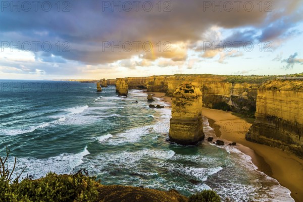 Fantastic morning light on the Pacific coast about Melbourne. The well-known rocks Twelve apostles in an ocean storm surf. Travel to Australia. Concept active and phototourism
