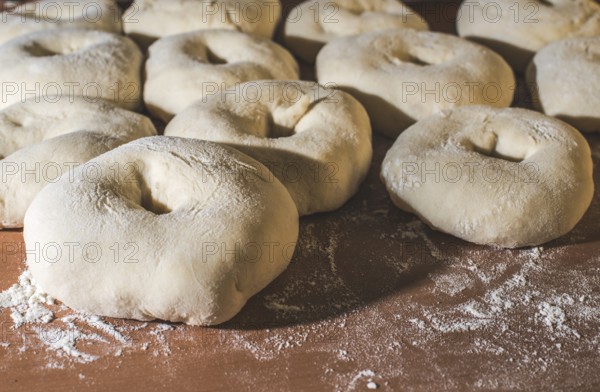 Kneading bagels close up