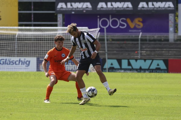 Tevfik Ceylan (FC 08 Villingen) chases the ball away from his Frankfurt opponent in this scene during the Football-RL SW 24-25: 6th Sptg: FC 08 Villingen vs Eintracht Frankfurt U21, Villingen-Schwenningen, Germany / Germany