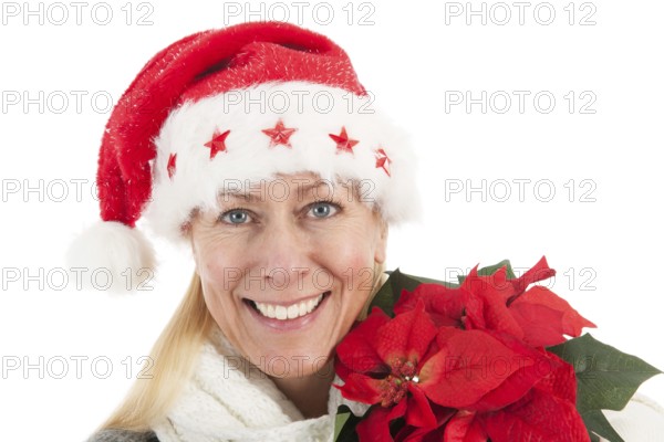 Middle aged woman portrait with hat of Christmas Santa Claus