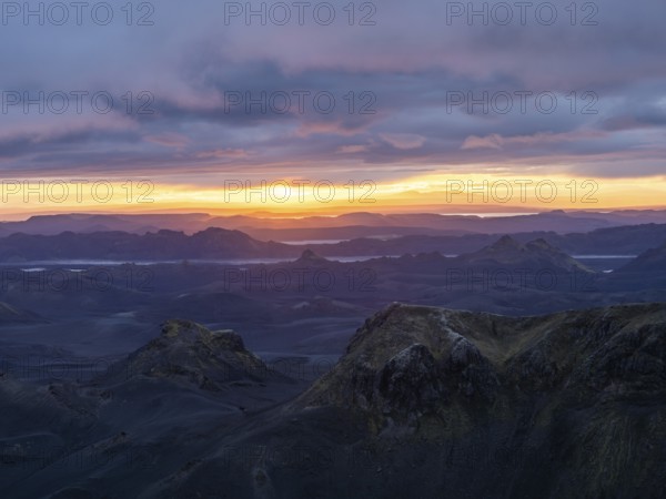 Cloudy mood and evening light at sunset, view from Mount Sveinstindur, volcanic landscape, lakes, mountains, Icelandic highlands, Iceland, Europe