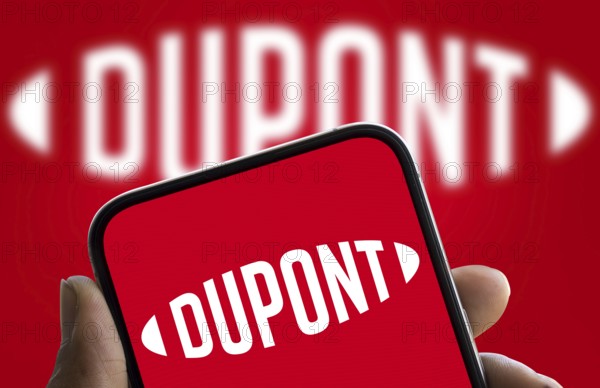 Dupont logo is displayed on smartphone. DuPont is an American multinational chemical company.