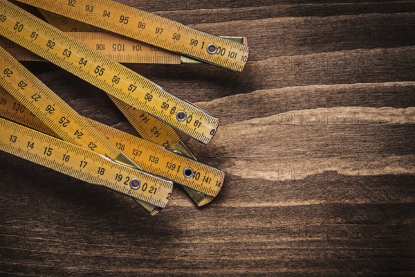 Wooden meter on wood board horizontal version construction concept