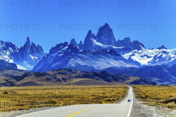 The road to the mountains. The border area between Argentina and Chile. Highway through the desert Patagonia goes to the magnificent mountain range Fitzroy. The concept of extreme, active and photo tourism
