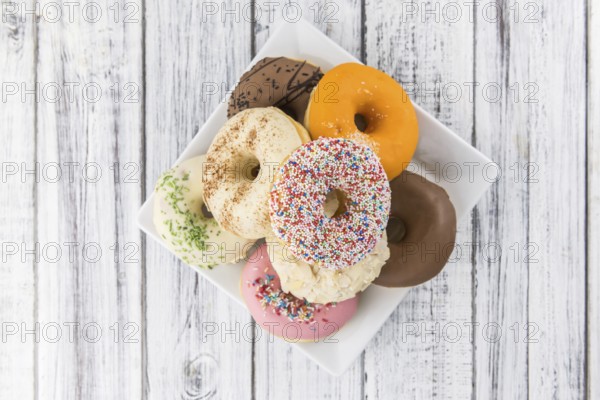 Portion of some Donuts as detailed close-up shot (fresh made, selective focus)