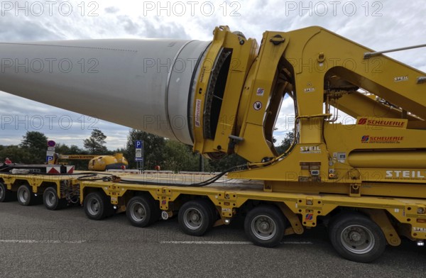 The heavy transport of the 68-metre-long rotor blades leads over the Feldberg (Breisgau-Hochschwarzwald district) to Freiburg's local mountain, the Schauinsland The rotor blades are mounted on a self-propelled transporter and travel at walking pace over several days to their destination Wind energy theme image, Feldberg in the Black Forest, Germany, Europe