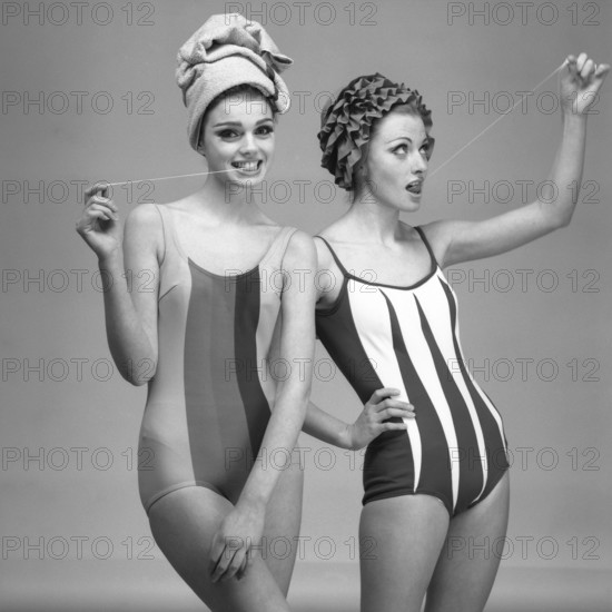 1960s swimsuit fashion. Two models are wearing the swimsuit fashion of 1963