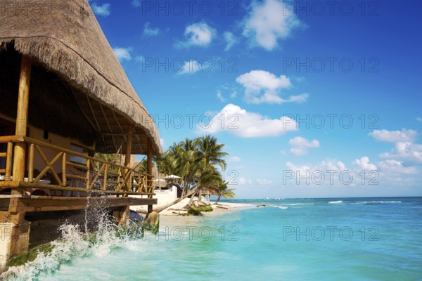 Playa del Carmen beach palapa in Riviera Maya Caribbean at Mayan Mexico