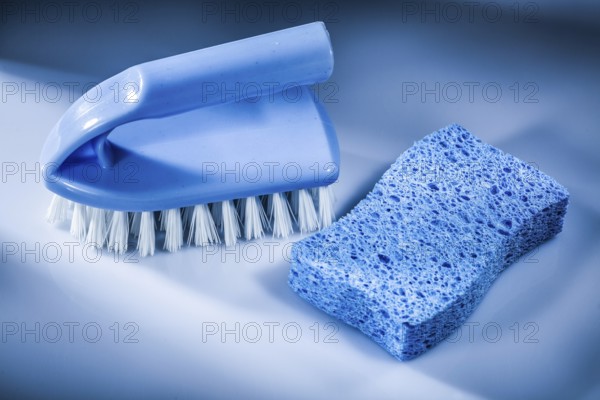 Plastic brush sponge on white background