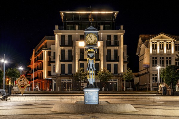 A view of the historic clock in Ahlbeck on the Baltic Sea at night on the island of Usedom