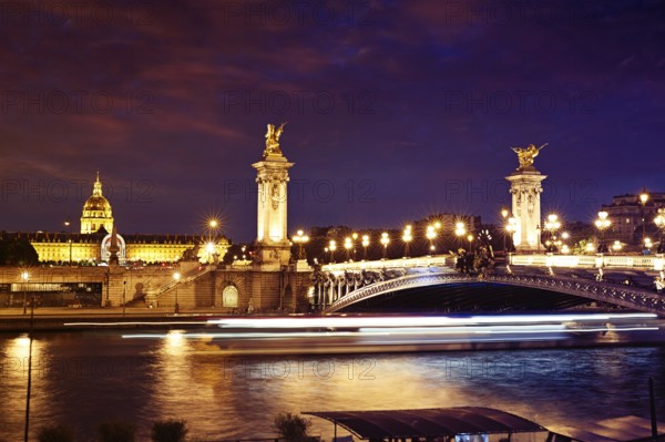 Pont Alexandre III in Paris France sunset over Seine river