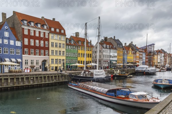 Nyhavn is a 17th-century waterfront, canal and entertainment district in Copenhagen, Denmark, Europe